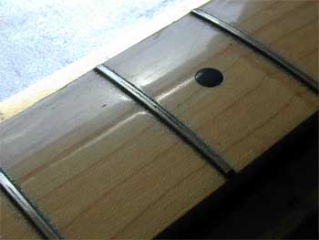 Telecaster frets rounded over after leveling